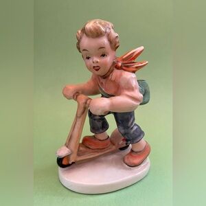 Vintage Friedel Boy on Scooter Figurine